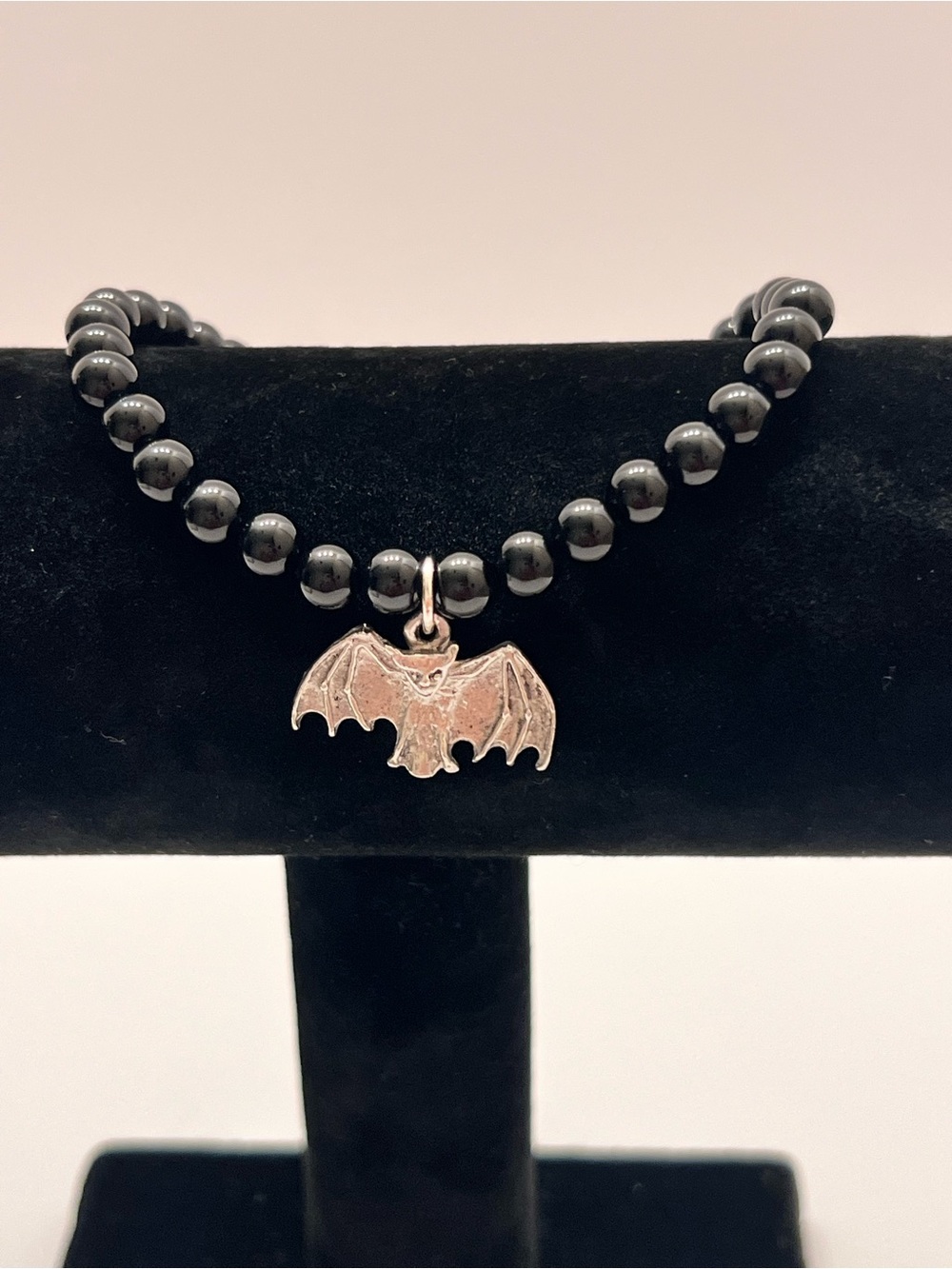 Black Beaded Bracelet with Silver Bat Charm